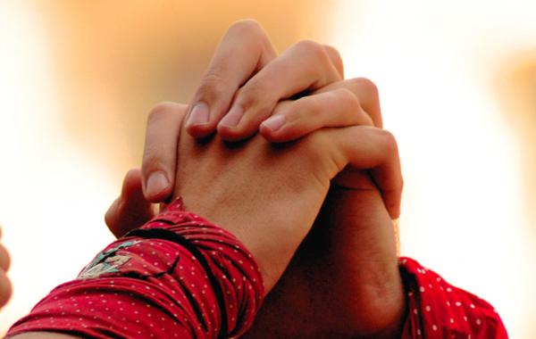 Hands intertwining, union, commitment